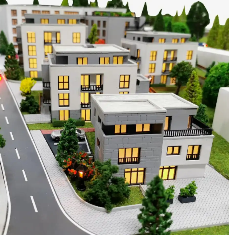 Beleuchtete und animierte Modelle von ARI Modellbau für die Anuga, die moderne Lebensmittelwerke, Logistikzentren, nachhaltige Agrarkomplexe, Energiesysteme und fortschrittliche Verarbeitungsanlagen darstellen. Mit LED-Beleuchtung, Animationen und in