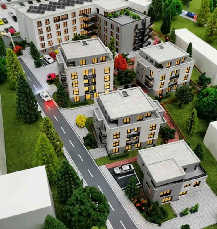 Maßgeschneiderte physische Modelle von ARI Modellbau für Anuga, darunter Lebensmittelproduktionsanlagen, Logistikzentren, landwirtschaftliche Einrichtungen und erneuerbare Energien. Mit Beleuchtung, animierten Funktionen und Interaktivität helfen die