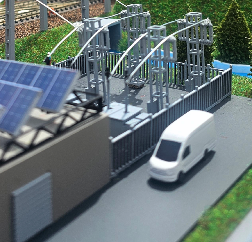 Individuelles beleuchtetes und animiertes Urban-Logistikmodell von ARI Modellbau, das multimodale Mobilität, städtische Verteilungsflüsse und nachhaltige Infrastruktur für Aussteller des Urban Logistics Summit darstellt.